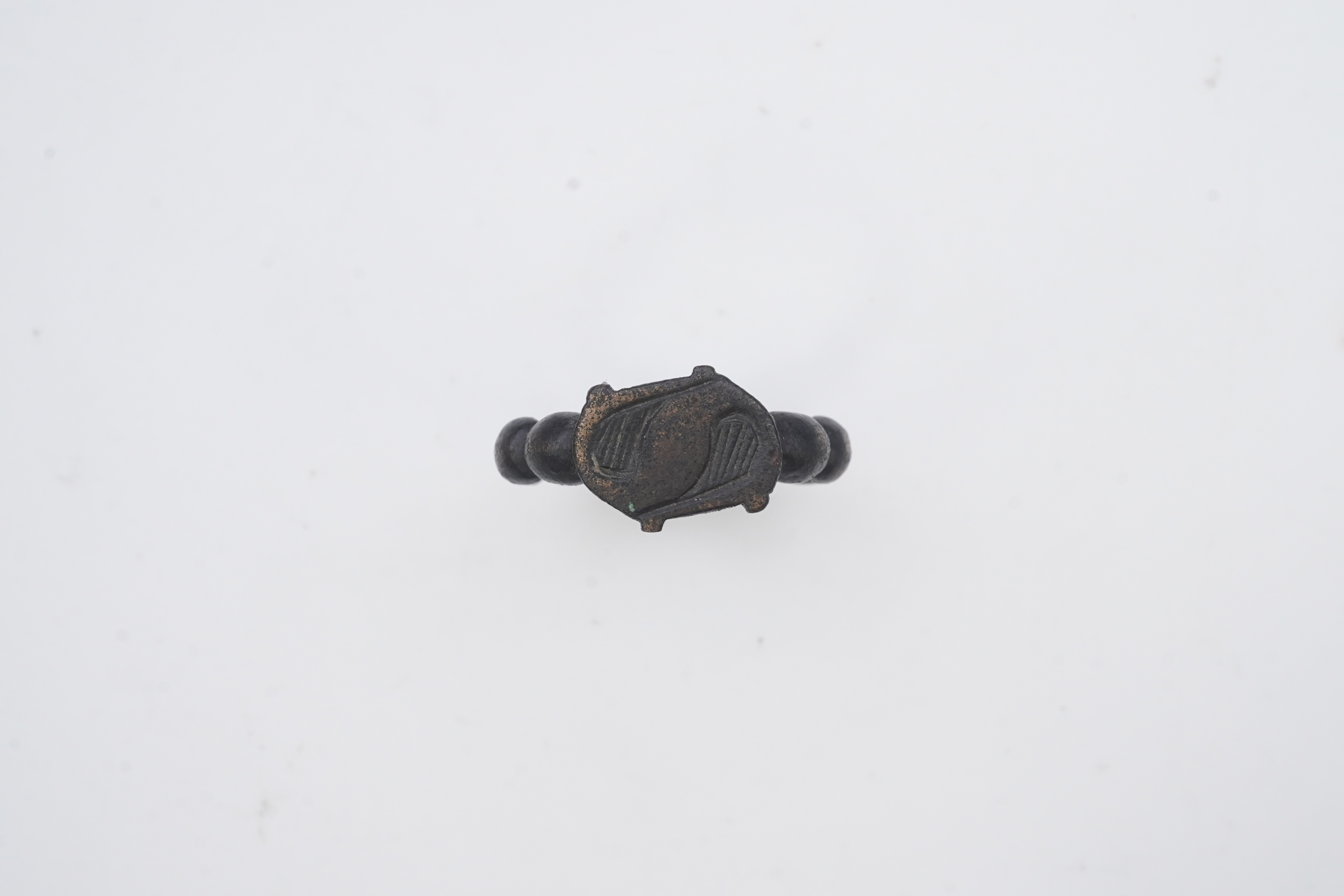 A Tudor bronze 'decade' ring, England, circa 1500